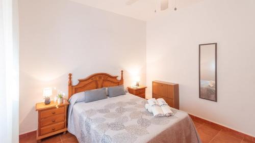 Ένα ή περισσότερα κρεβάτια σε δωμάτιο στο Villa Pajaritos Iznate by Ruralidays