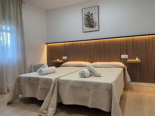 Ένα ή περισσότερα κρεβάτια σε δωμάτιο στο Casa rural Los Girasoles