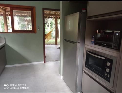 Kuchyň nebo kuchyňský kout v ubytování Casa de Praia, Paraíso Verde