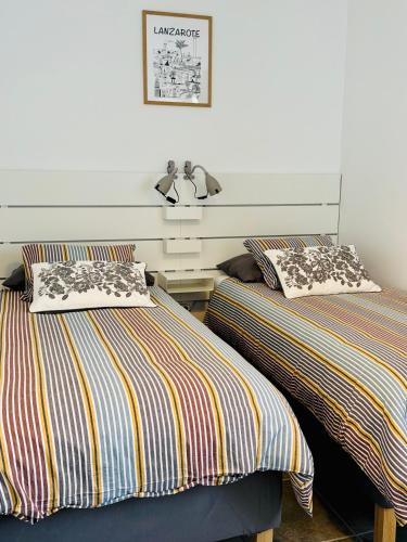 Ένα ή περισσότερα κρεβάτια σε δωμάτιο στο Lovely Casa Deseada