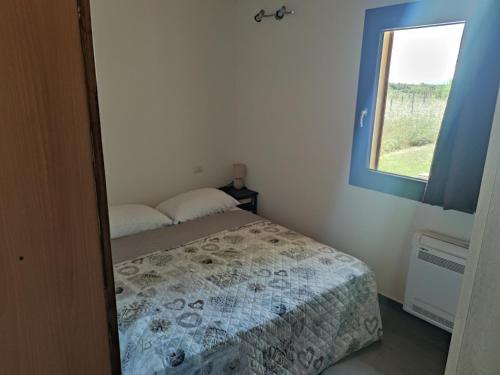 Ένα ή περισσότερα κρεβάτια σε δωμάτιο στο Roby's house, vivi la vacanza in relax (2L)