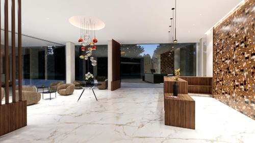 a lobby of a house with a stone floor at SH Campus Lyceum in Moncada