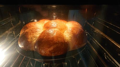 two loaves of bread sitting in an oven at Chalet LE VAL NESS in La Côte dʼArbroz