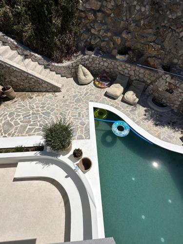 an overhead view of a small pool of water at Aella Exclusive Residences Lefkada in Mikros Gialos