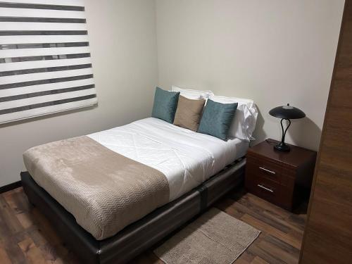 Postel nebo postele na pokoji v ubytování Departamento amoblado