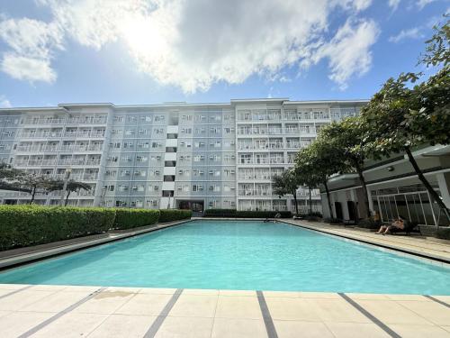 Πισίνα στο ή κοντά στο DC Trees Residences Staycation