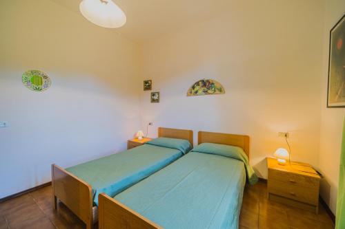 Katil atau katil-katil dalam bilik di Appartamenti Casa Sant'Andrea - Goelba