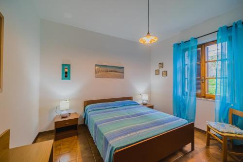 Katil atau katil-katil dalam bilik di Appartamenti Casa Sant'Andrea - Goelba