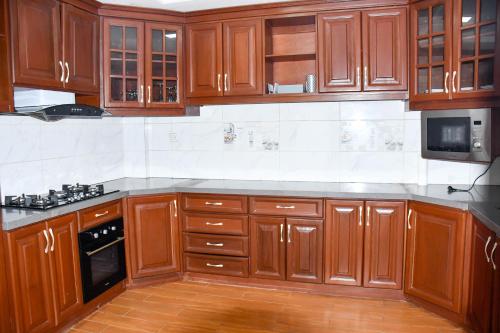 Køkken eller tekøkken på Residence SCI ABBAS