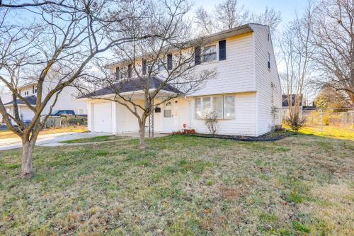 a white house with a tree in the yard at 3 Mi to Dtwn Home with Yard in Newark in Newark