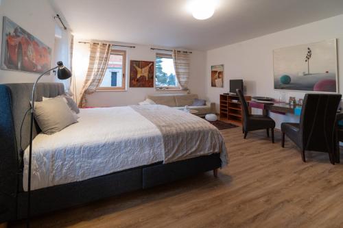 Postel nebo postele na pokoji v ubytování Apartmán v centru