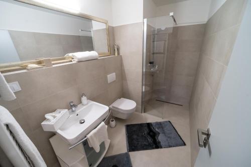Koupelna v ubytování Apartmán v centru