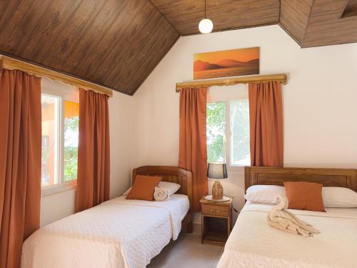 Cama o camas de una habitación en Hostal Familiar Rolo