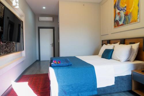 GRAND MOON HOTELにあるベッド