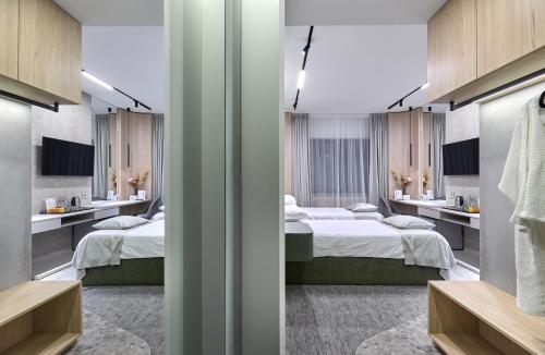 Кровать или кровати в номере AVO Hotel