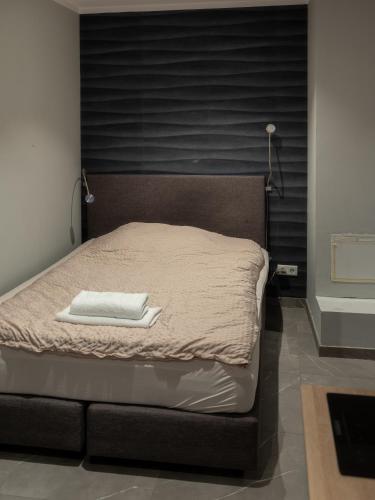 Ένα ή περισσότερα κρεβάτια σε δωμάτιο στο Boardinghouse 23