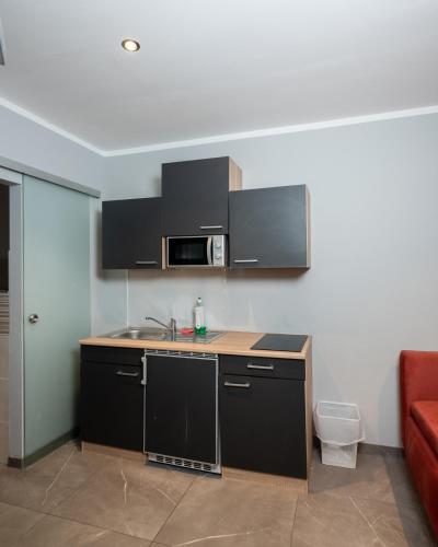 Η κουζίνα ή μικρή κουζίνα στο Boardinghouse 23