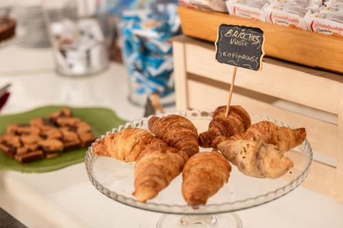 リミニにあるホテル ローザビアンカのクロワッサン皿