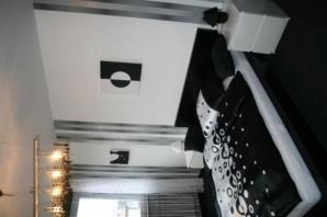 a room with a window and a bed with pillows at Hotel Rosenhof in Isenbüttel