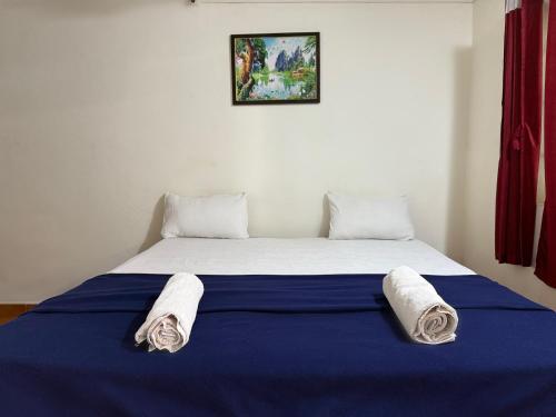 Кровать или кровати в номере Village Harmony Guest House