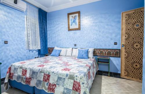 Postel nebo postele na pokoji v ubytování Hotel Tarek