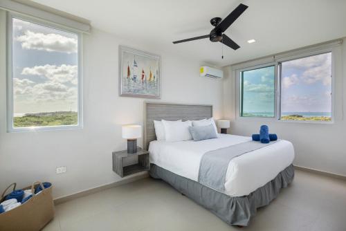 Кровать или кровати в номере Azulea Isla Mujeres Hotel