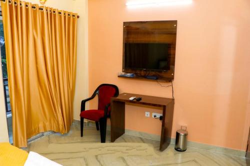 TV a/nebo společenská místnost v ubytování Sunflower Inn