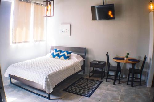 Postel nebo postele na pokoji v ubytování Las Alturas Loft 302