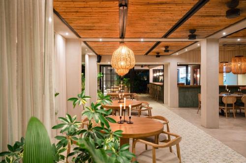 Un restaurante u otro lugar para comer en Hotel Palo Cruz