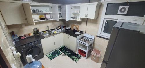 Jasmine House tesisinde mutfak veya mini mutfak