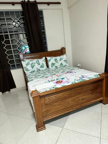 Ένα ή περισσότερα κρεβάτια σε δωμάτιο στο Stay In Zanzibar On A Budget