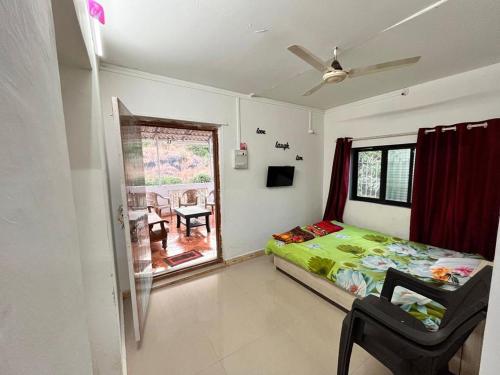 Televisyen dan/atau pusat hiburan di Palms Villa - First Floor