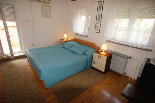 Postel nebo postele na pokoji v ubytování Guest House Marta