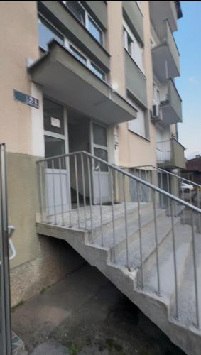 a balcony of a building next to a building at Apartman Banja Luka CITY in Banja Luka