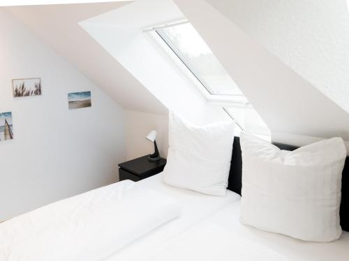 Katil atau katil-katil dalam bilik di Ferienwohnung Moorblick