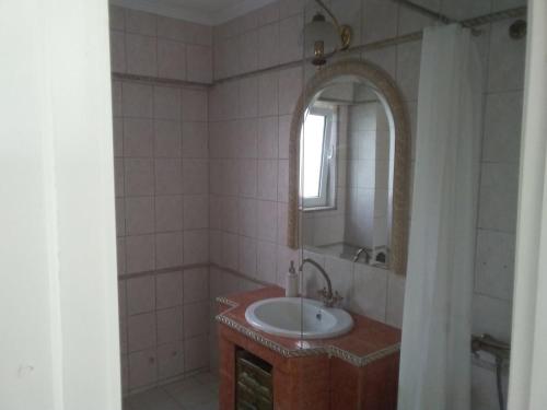 Ένα μπάνιο στο Penthouse Peaceful Oasis