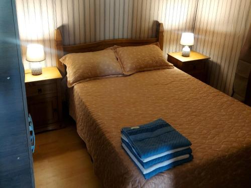 Ένα ή περισσότερα κρεβάτια σε δωμάτιο στο Cabaña Sunset , 6 personas , 2 cuartos a 3 cuadras de la playa