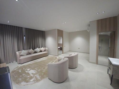 a large living room with a couch and a bed at فيلا هيفاء in Medina