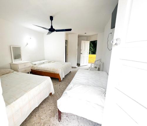 Ένα ή περισσότερα κρεβάτια σε δωμάτιο στο Hotel Walton