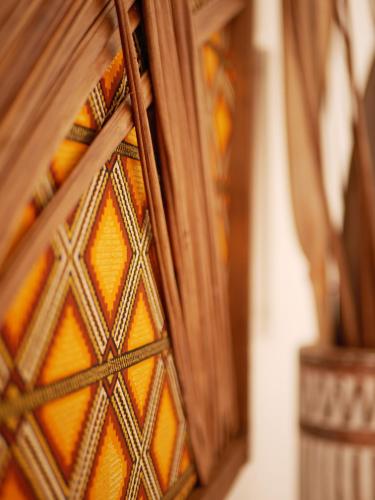 a close up of a stained glass window at Coco Soley in Le Diamant