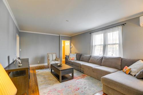 a living room with a couch and a table at 3 Mi to Downtown Spacious White Plains Home in White Plains