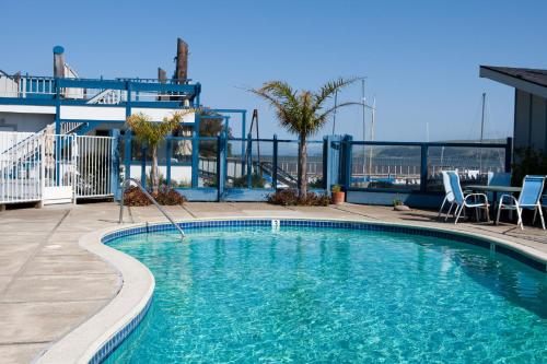 a swimming pool on top of a building at Tomales Bay Lodge and Marina Inc in Inverness