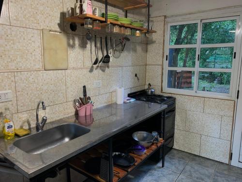 O bucătărie sau chicinetă la Posada Pagana