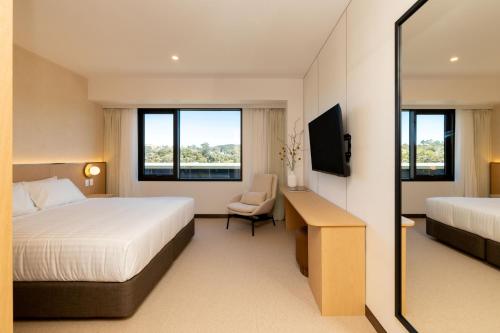 Postel nebo postele na pokoji v ubytování Maxim Hotel - Auckland
