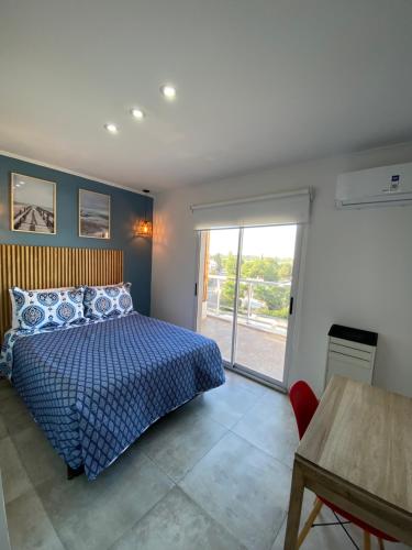 Postel nebo postele na pokoji v ubytování Departamento boutique del mar 2