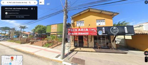a store on the side of a street at Morada Iluminada in Garopaba