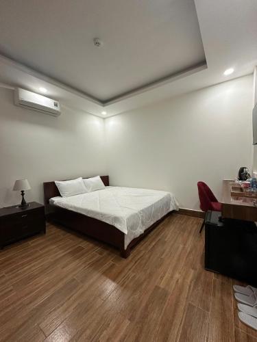 Kim Hotel Vincom Tây Ninhにあるベッド