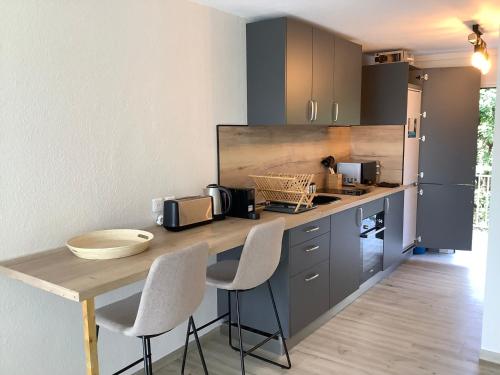 Η κουζίνα ή μικρή κουζίνα στο Studio 16 Vue mer Orient Beach