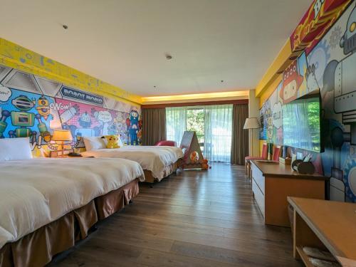 Una cama o camas en una habitación de Howard Beach Resort Kenting