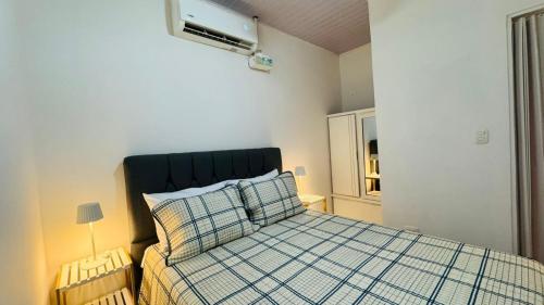 Postel nebo postele na pokoji v ubytování Jaco Park